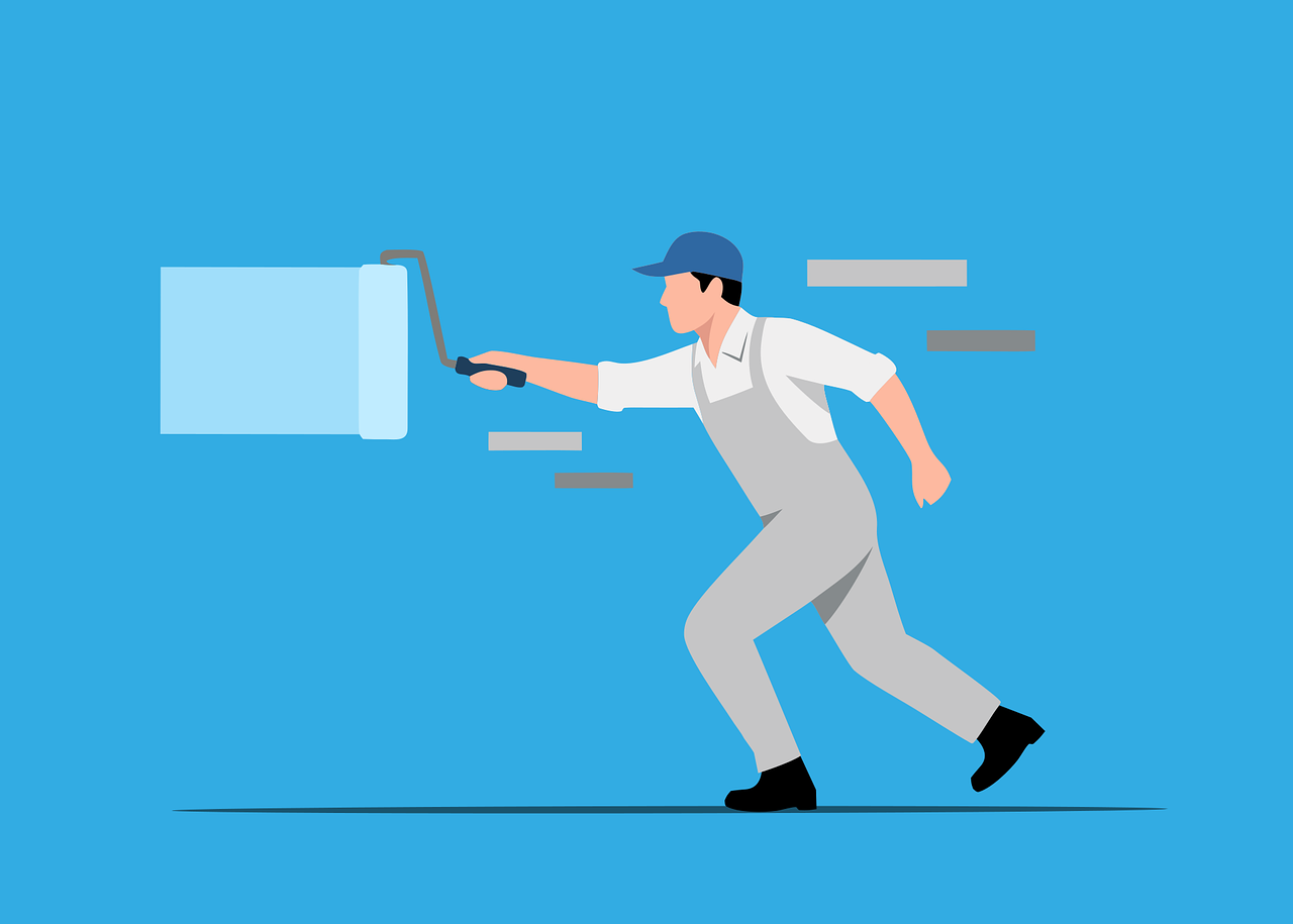 ammattimaalari maalaa seinää telalla ulko- ja sisämaalaus